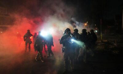 Protesters face off with officers after another immigration shooting in Minneapolis