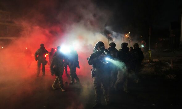 Protesters face off with officers after another immigration shooting in Minneapolis