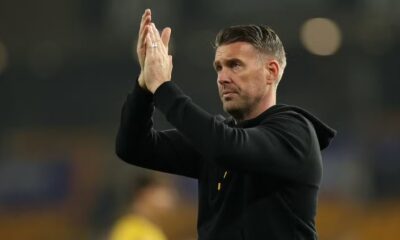 Wolverhampton Wanderers manager Rob Edwards applauds fans after the match