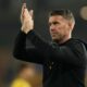 Wolverhampton Wanderers manager Rob Edwards applauds fans after the match