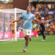 WOLVERHAMPTON, ENGLAND - AUGUST 16: Tijjani Reijnders of Manchester City celebrates scoring his sides second goal during the Premier League match between Wolverhampton Wanderers and Manchester City at Molineux on August 16, 2025 in Wolverhampton, England. (Photo by Alex Pantling/Getty Images)