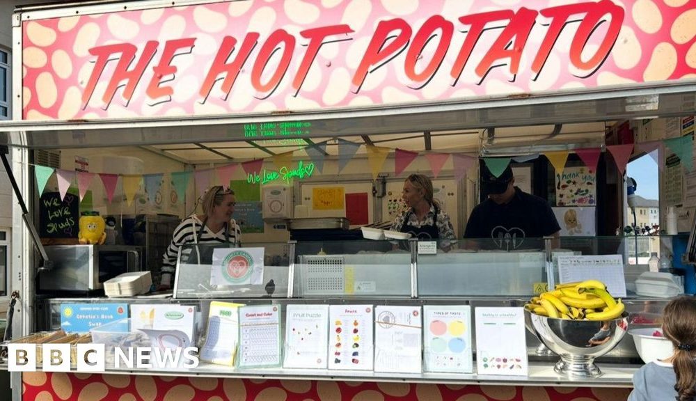 Spud truck handing out free meals to families