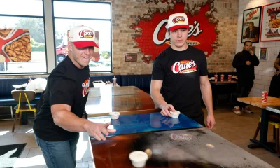 Christian and Luke McCaffrey Work Pre-Pro Bow Shift at Raising Cane's in the Bay Area During Super Bowl Week