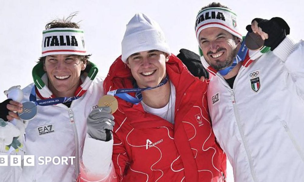 Giovanni Franzoni, Franjo von Allmen and Dominik Paris with their Olympic medals