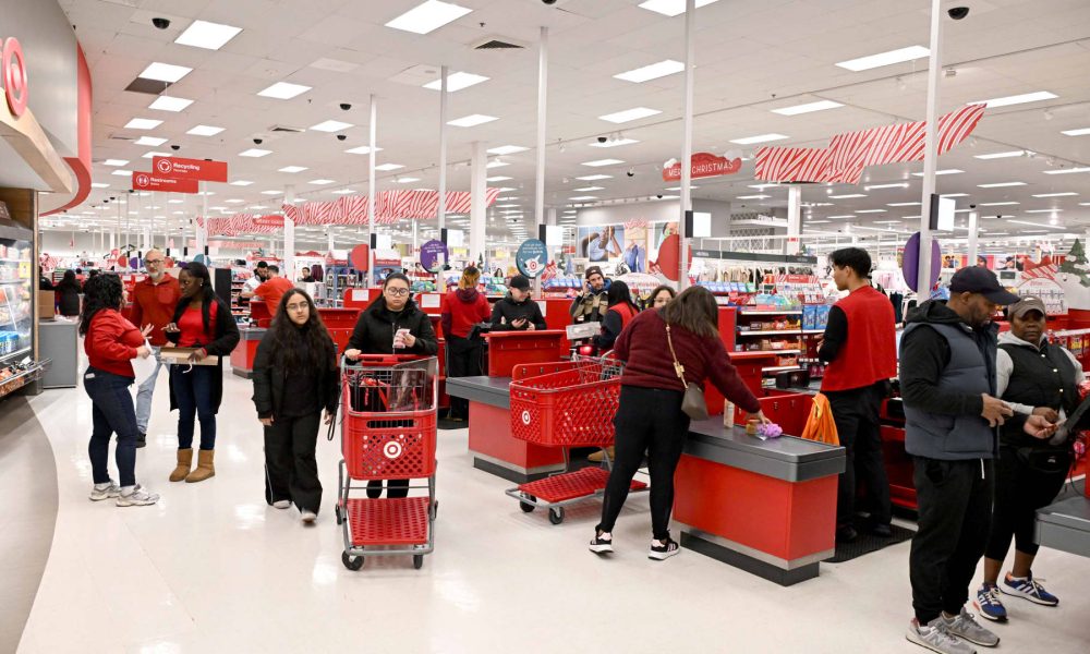Target steps up investment in store staffing, cuts about 500 other roles