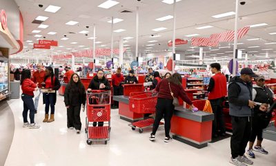 Target steps up investment in store staffing, cuts about 500 other roles