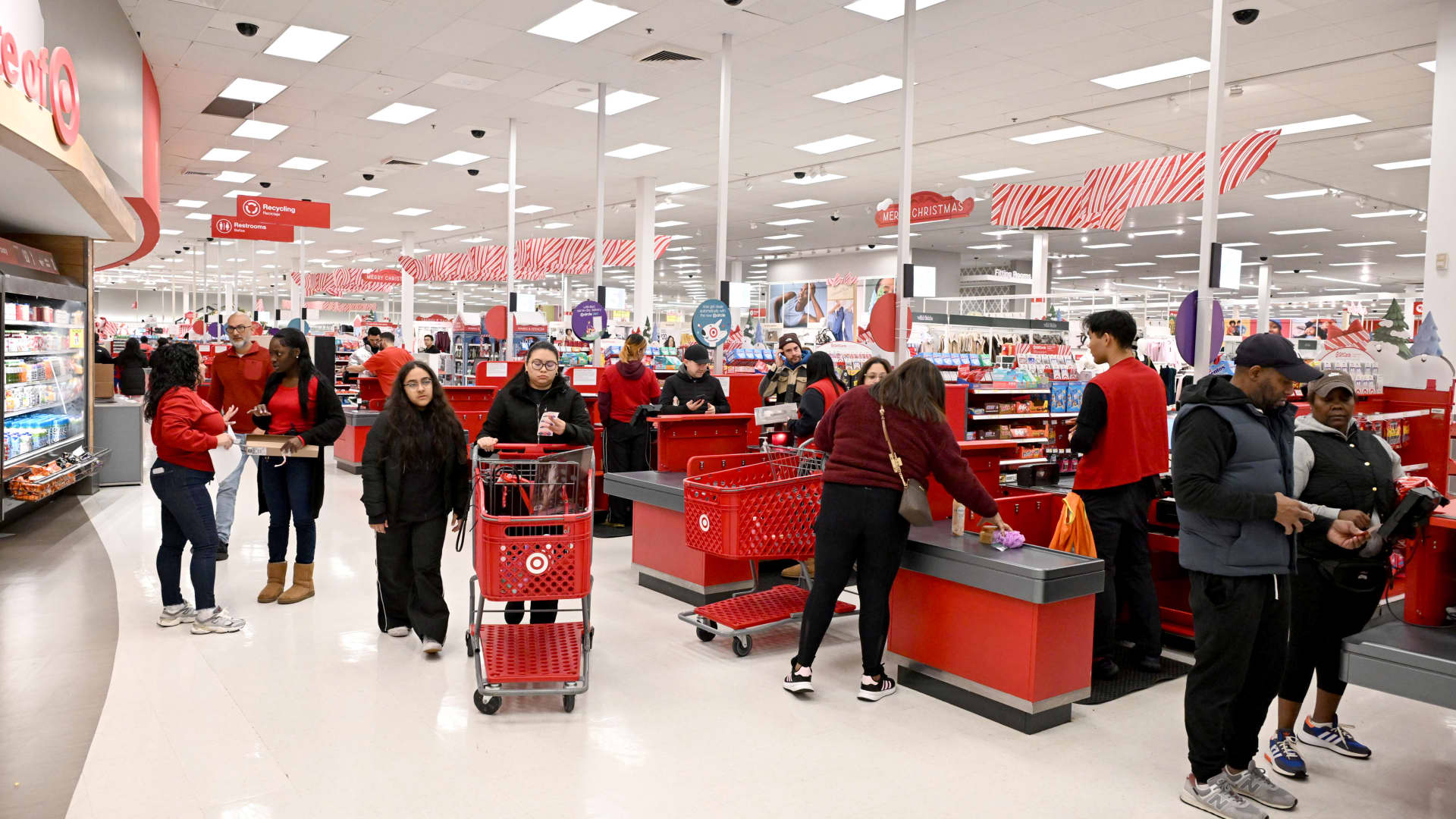 Target steps up investment in store staffing, cuts about 500 other roles