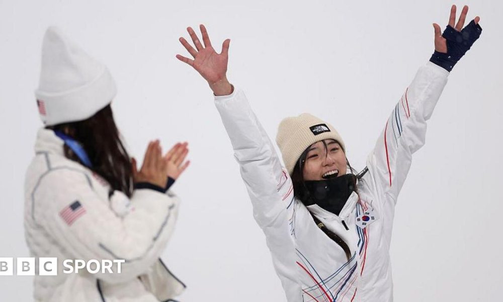 Choi Ga-on celebrates, watched on by Chloe Kim