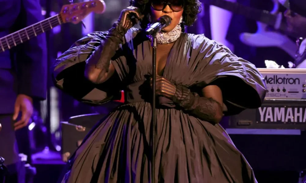 2 Lauryn Hill Performs In Carolina Herrera Spring 2026 Black Gown At The GRAMMYs Tribute Honoring DAngelo Roberta Flack And More