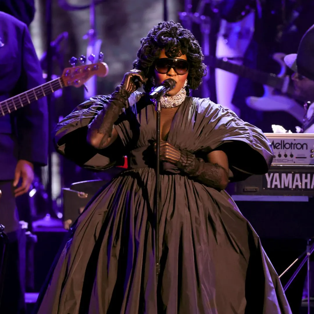 2 Lauryn Hill Performs In Carolina Herrera Spring 2026 Black Gown At The GRAMMYs Tribute Honoring DAngelo Roberta Flack And More