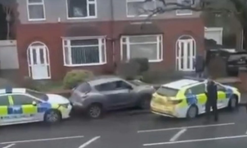 Car smashes past two police cars to make escape in Farnworth