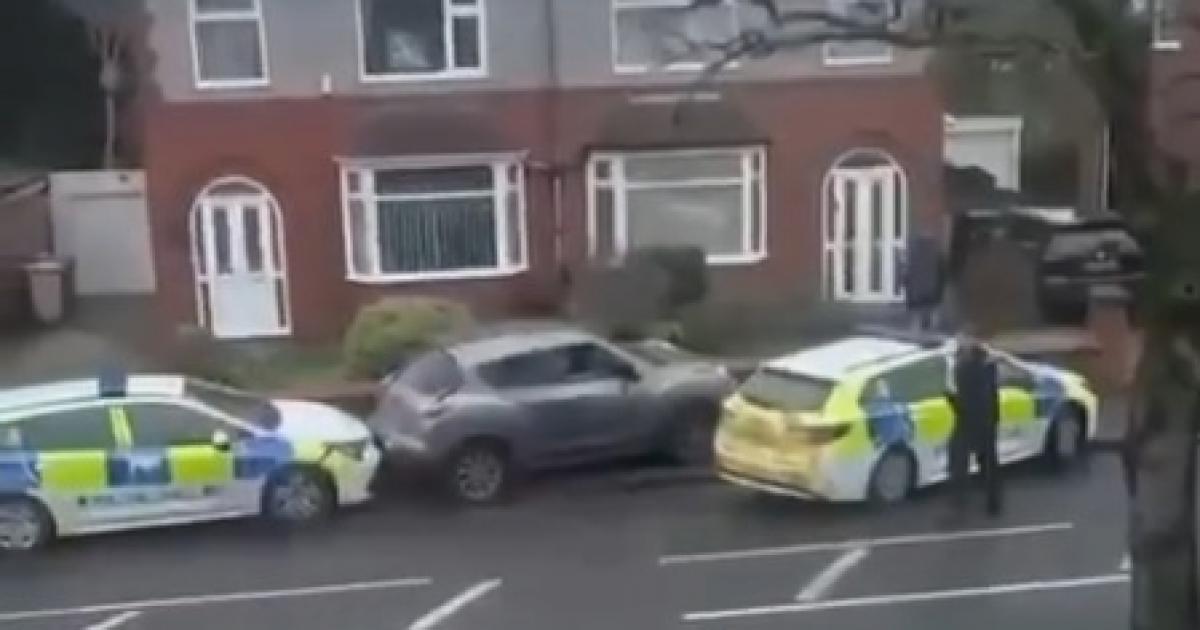 Car smashes past two police cars to make escape in Farnworth