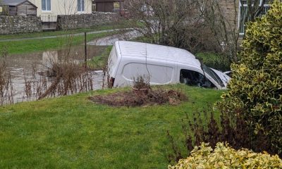 Van gets stuck in floodwater in in Hunton village ford