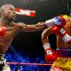Floyd Mayweather throws a punch at Manny Pacquiao during their welterweight unification championship bout in May 2015 at MGM Grand Garden Arena in Las Vegas