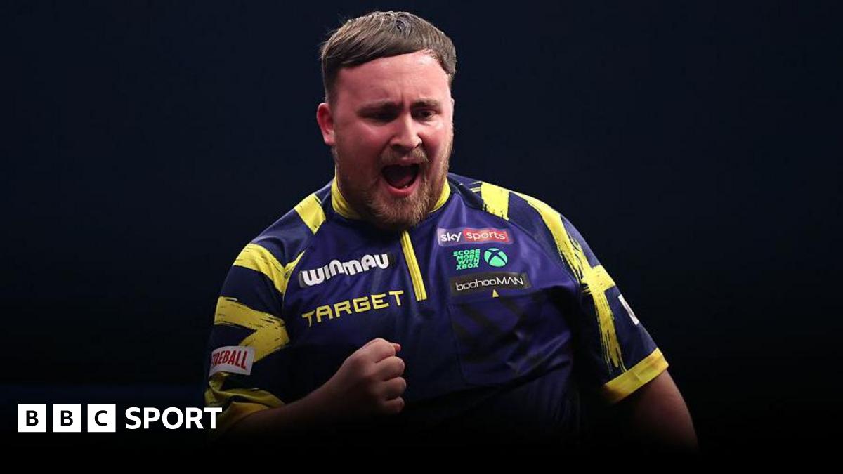 Luke Littler celebrates