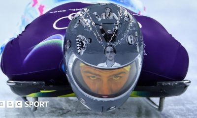 Vladyslav Heraskevych wears helmet with images of those killed in Ukraine war while training for skeleton in Cortina, Italy at Winter Olympics