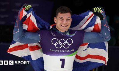 Matt Weston and Martins Dukurs hug