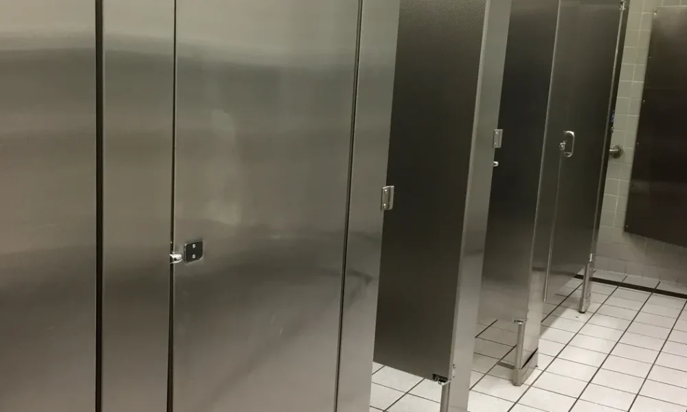 Why You Should Not Stay In A Toilet Cubicle After Flushing