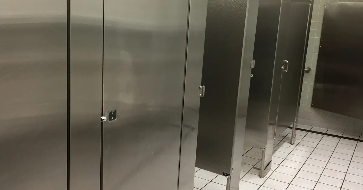 Why You Should Not Stay In A Toilet Cubicle After Flushing