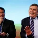 Ex-Prime Minister and Labour Party leader, Gordon Brown, right, and then-Business Secretary Peter Mandelson react as they speak to the media about economy in a press conference in London, Monday, April 19, 2010.