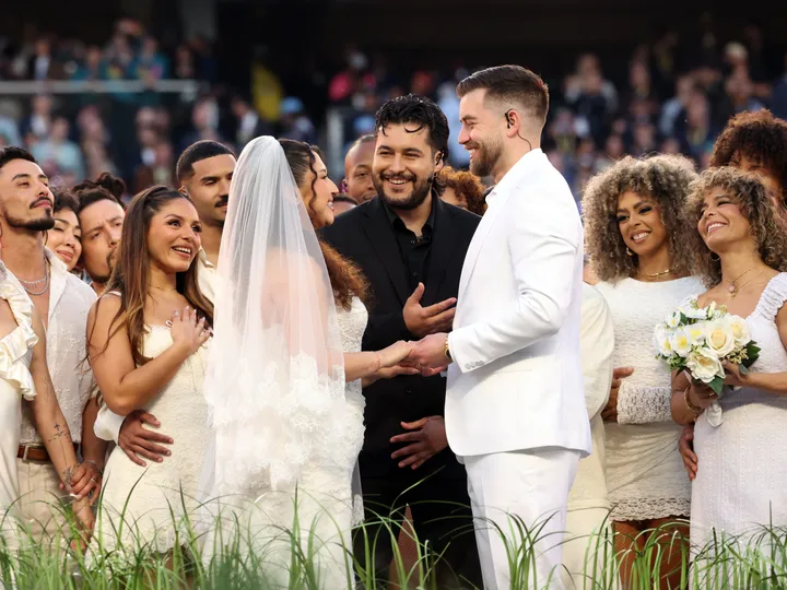 A couple is married during the Apple Music Super Bowl LX Halftime Show at Levi's Stadium on Feb. 8, 2026, in Santa Clara, California.