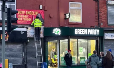 A poster for the Labour candidate was put up next to the Green Party offices
