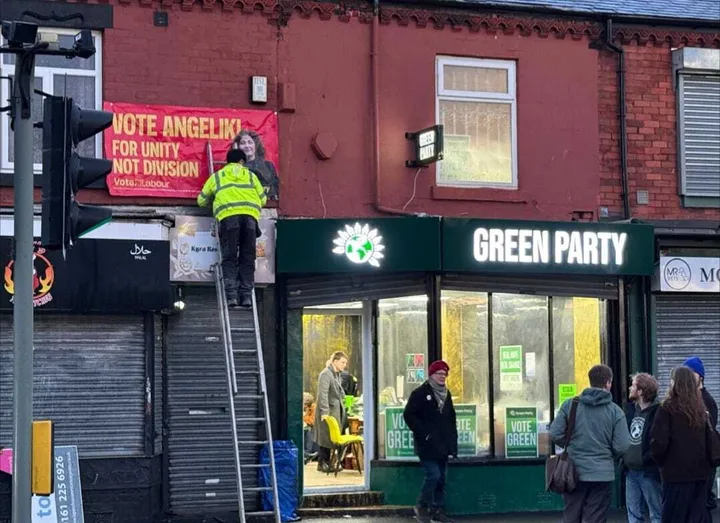 A poster for the Labour candidate was put up next to the Green Party offices