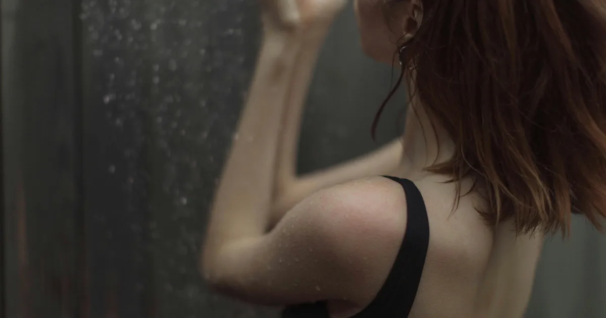 Can Showering In The Dark Help You Sleep Better? Experts Weigh In