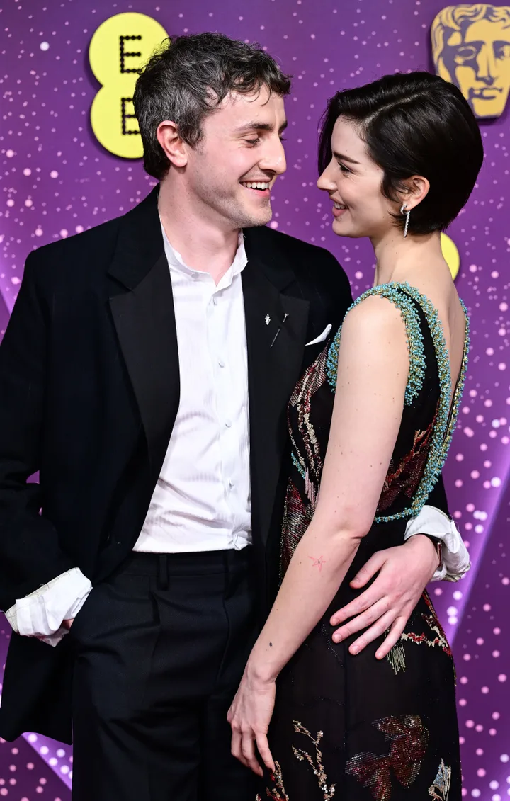 Paul Mescal and Gracie Abrams share a laugh on the Baftas red carpet