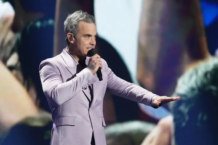 Robbie Williams performing live last year