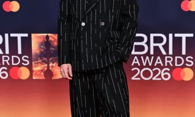 What a smile, what a suit, what a shoe choice