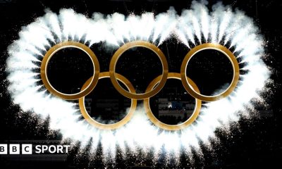 The Olympic rings come together as a fireworks display during the 2026 Winter Olympics opening ceremony in Milan-Cortina