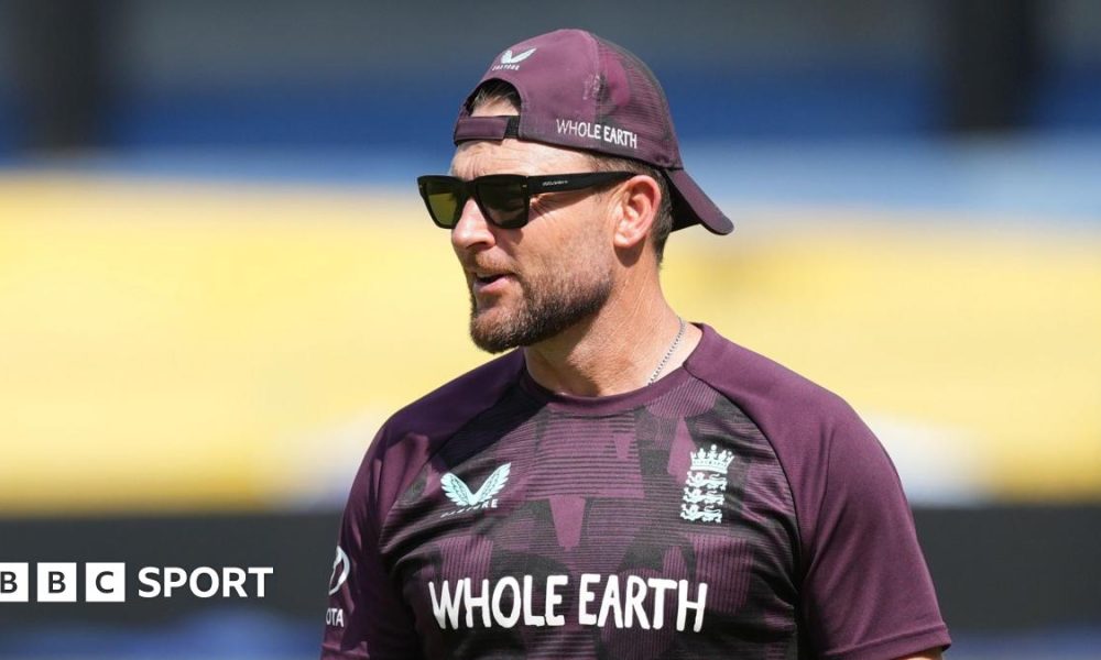Brendon McCullum looks on during training