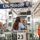 What is the UK's new travel system and how are dual nationals affected?