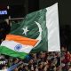 Spectators wave India and Pakistan flags