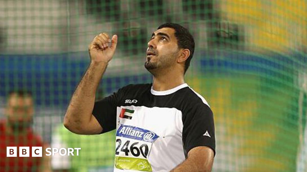 Abdullah Hayayei holds up his hand