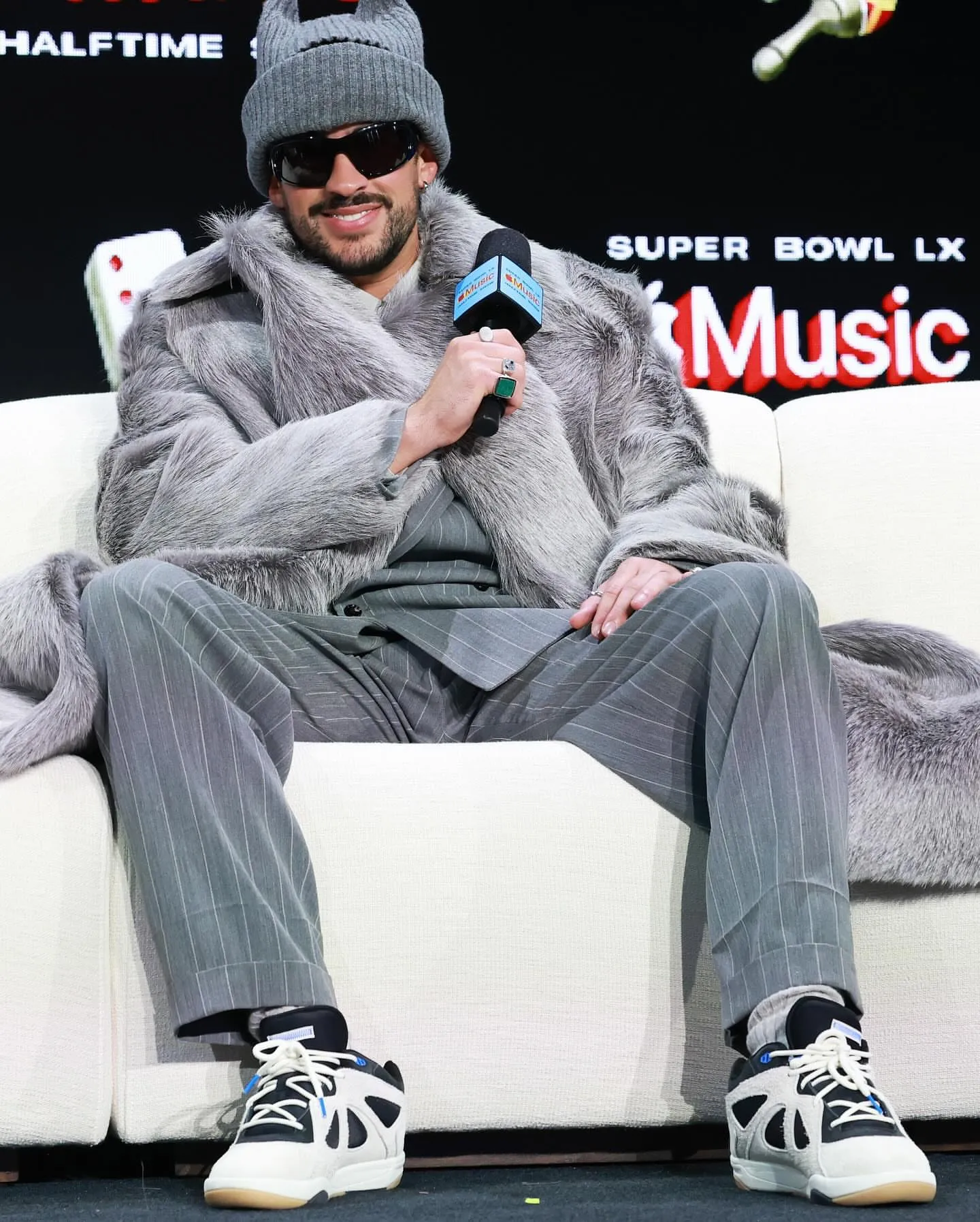 Bad Bunny Wore A Grey New Bottega SpringSummer 2026 Look To The Apple Music Super Bowl LIX Halftime Show Press Conference 1