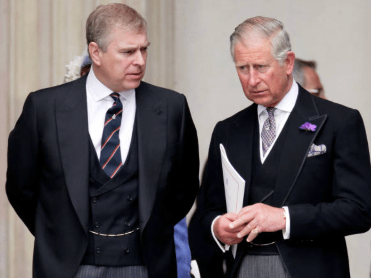 Charles gets heckled over paedo associate brother