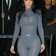 Kim Kardashian seen wearing a grey outfit as posing outside the Nike Store in New York City
