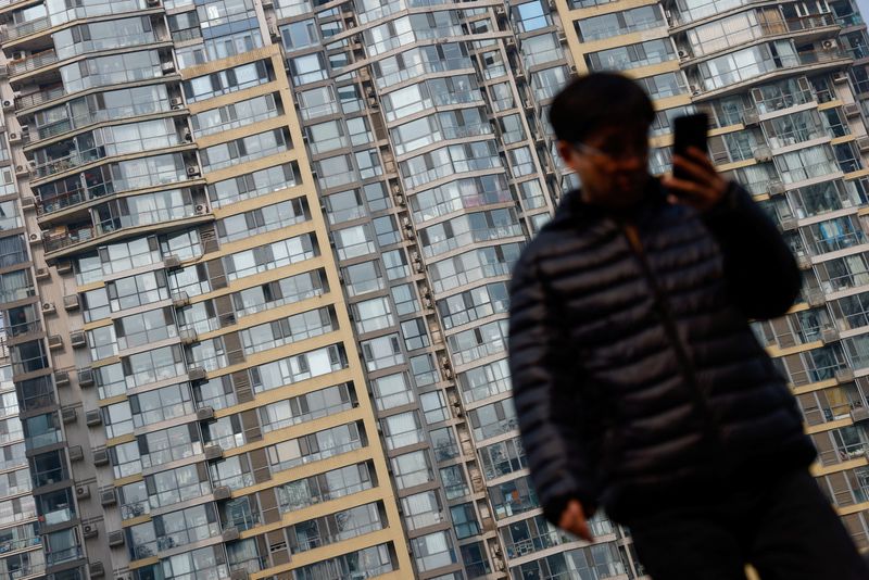 China new home prices rise in January as government signals support, private survey says