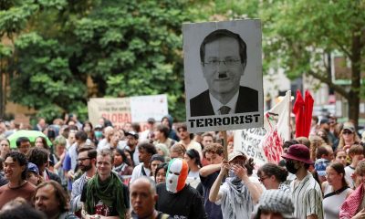 Protests dog Israeli president’s last day in Australia