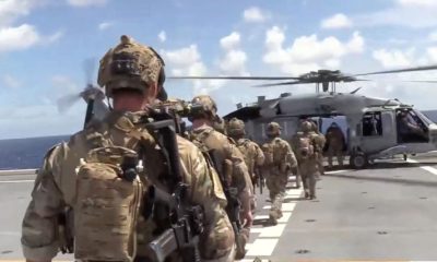 US says it interdicted and boarded vessel defying Trump’s quarantine