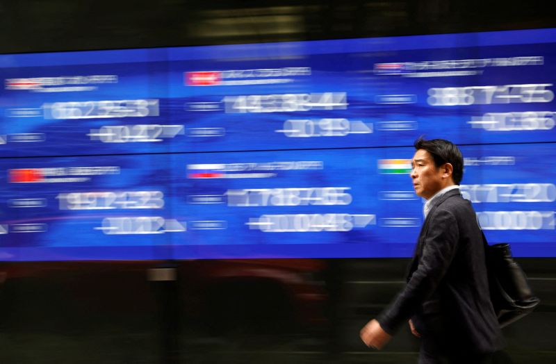 Global stocks steady as US-Iran talks, AI keep market on edge