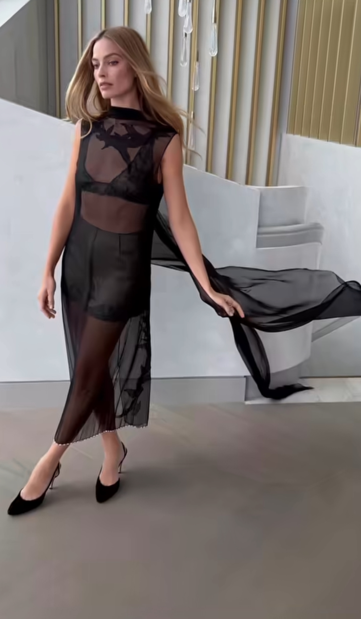 Margot Robbie Turns Up The Drama In Sheer Black Chanel Couture At A Press Event 3