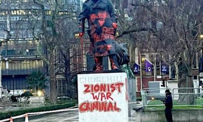 Churchill statue painted red by Dutch activist group