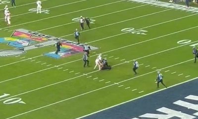Topless streaker halts Super Bowl before being tackled by New England Patriots star in wild scenes