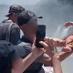 Tourist dangles baby over edge of 260ft waterfall for a holiday snap in Argentina | News World