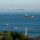 Iran defends itself via closing key shipping strait