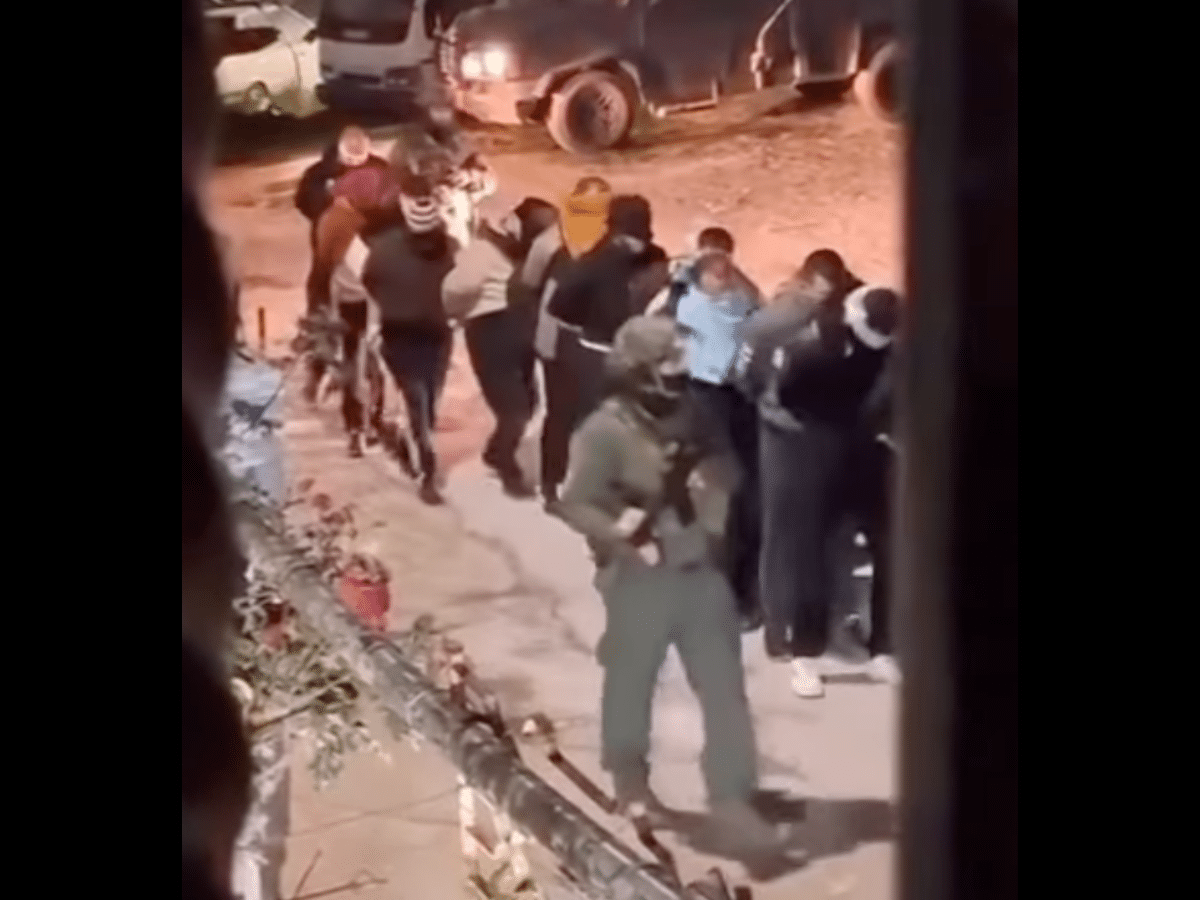 Israel marches detained Palestinians through street