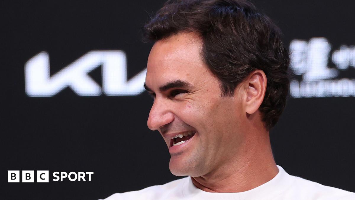 Roger Federer laughs during a news conference at the 2026 Australia Open